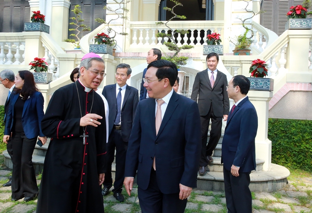 Phó Thủ tướng Thường trực Phạm Bình Minh chúc mừng Giáng sinh tại TP.HCM - Ảnh 1.