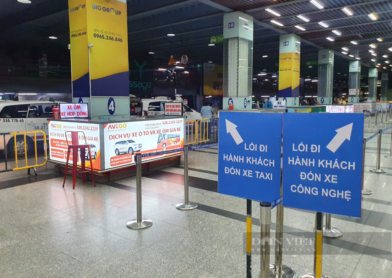 Sân bay Tân Sơn Nhất có thêm làn xe công nghệ, 5 phút có xe, nhân viên vác cả hành lý cho khách - Ảnh 4.