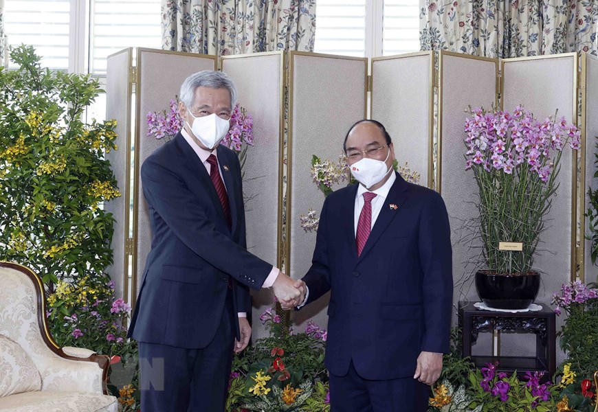 Lễ đón Chủ tịch nước Nguyễn Xuân Phúc thăm cấp Nhà nước tới Singapore - Ảnh 11.