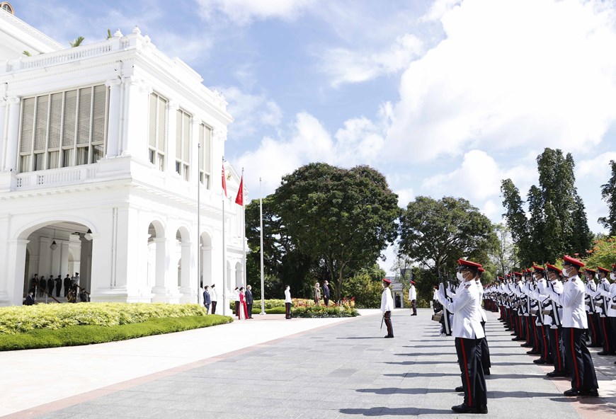 Lễ đón Chủ tịch nước Nguyễn Xuân Phúc thăm cấp Nhà nước tới Singapore - Ảnh 6.