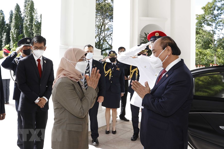 Lễ đón Chủ tịch nước Nguyễn Xuân Phúc thăm cấp Nhà nước tới Singapore - Ảnh 7.