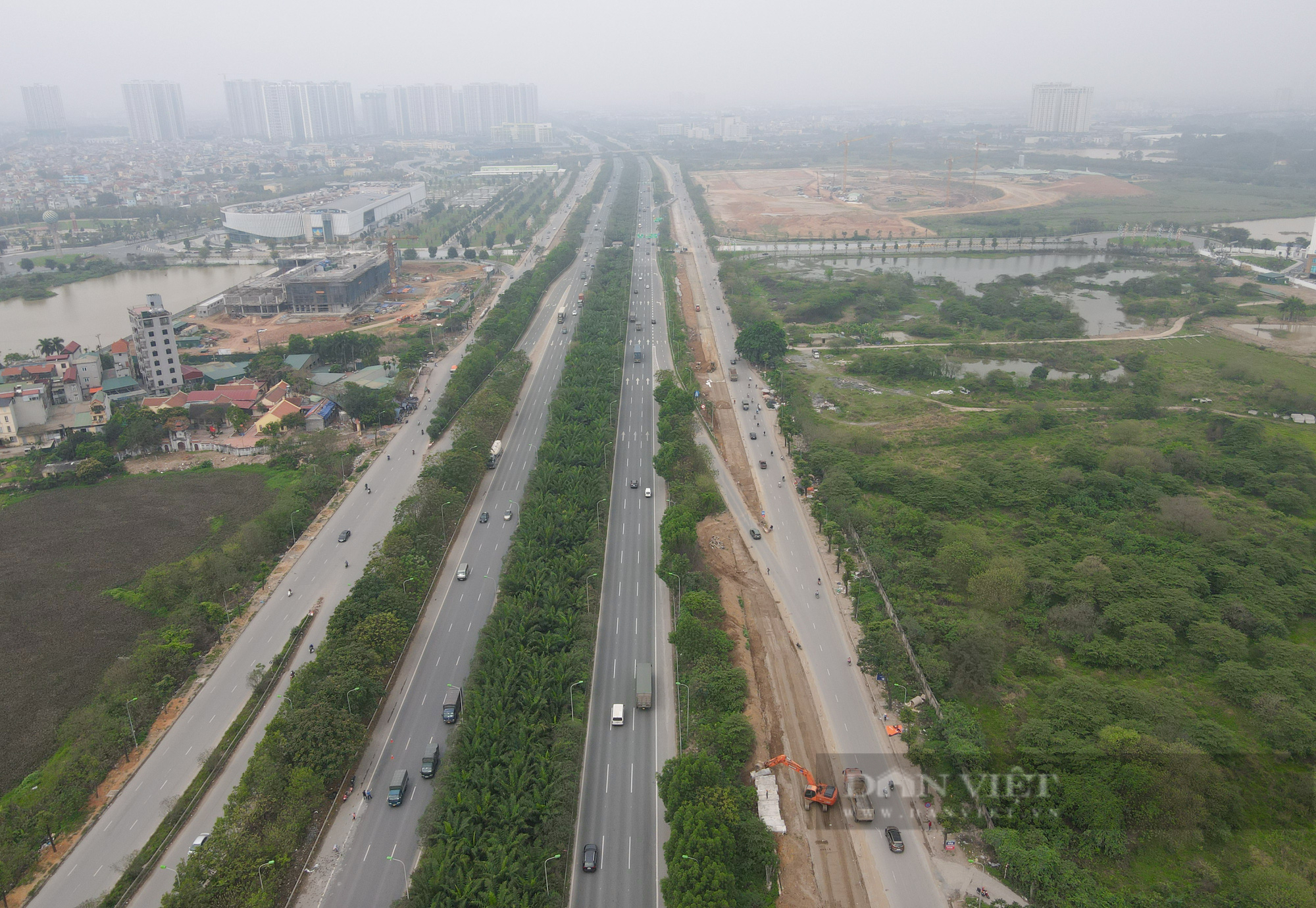 Hà Nội: Cảnh tấp nập trên công trường mở rộng, chống ngập lụt tại Đại lộ Thăng Long    - Ảnh 2.