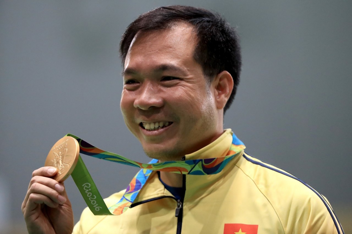 HCV Olympic Hoàng Xuân Vinh chia sẻ cảm xúc được châm đuốc SEA Games 31 - Ảnh 1.