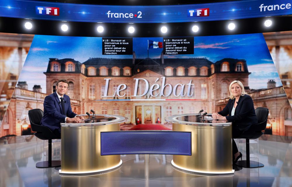 Bầu cử tổng thống Pháp: Ông Macron &quot;tấn công&quot; vào mối quan hệ giữa bà Le Pen và Nga - Ảnh 1.