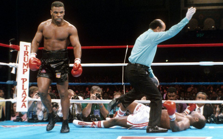 Why does Mike Tyson wear shoes but not socks in the ring?