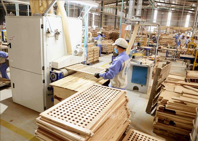 Doanh nghiệp gỗ đã kín đơn hàng đến hết quý III/2022 - Ảnh 1.