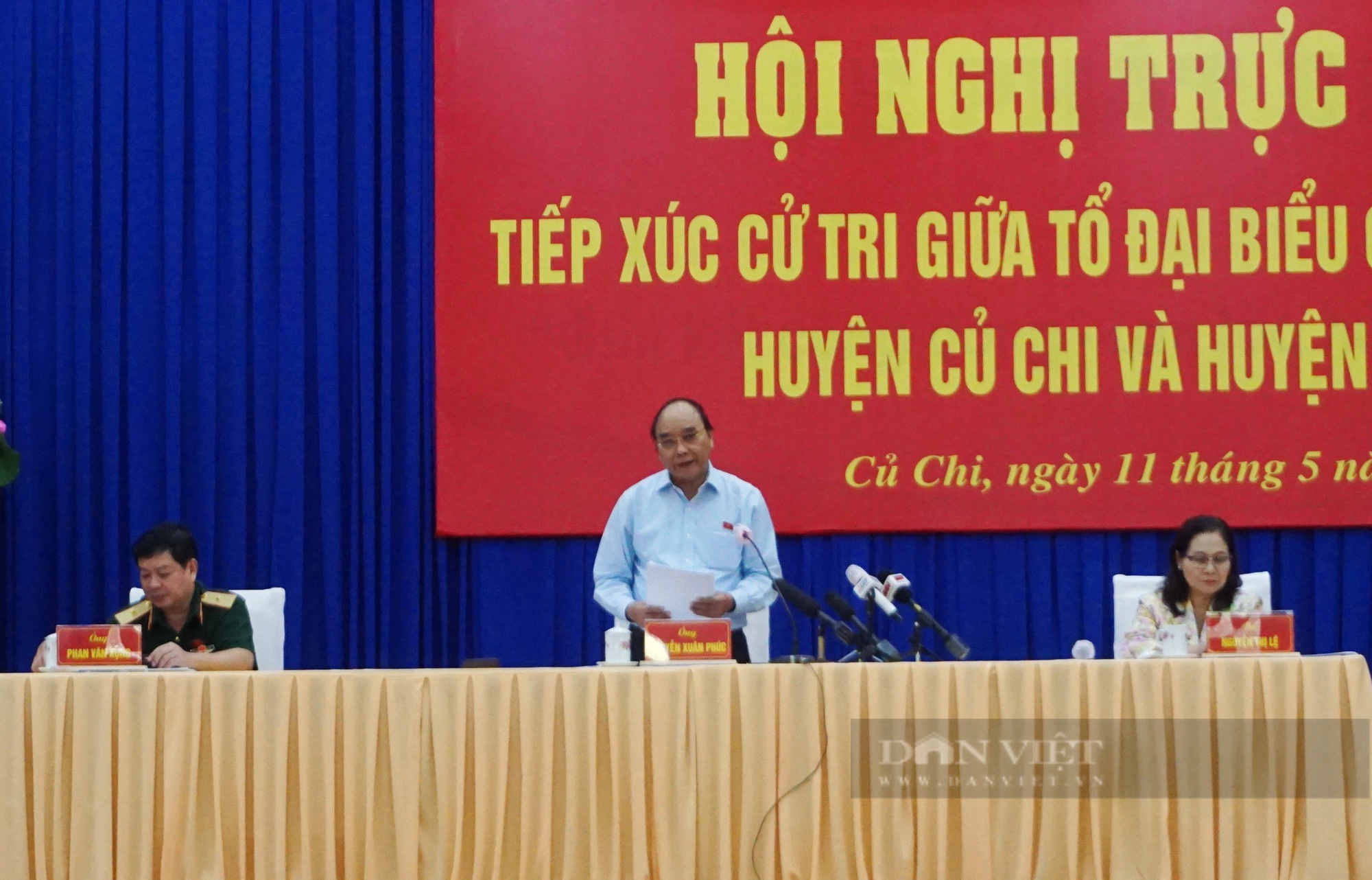 Chủ tịch nước Nguyễn Xuân Phúc: Củ Chi, Hóc Môn - thành phố sinh thái phía tây nhưng phát triển chưa xứng tầm - Ảnh 1.