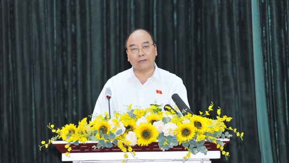 Chủ tịch nước Nguyễn Xuân Phúc: Không được né tránh đối thoại với dân - Ảnh 1.