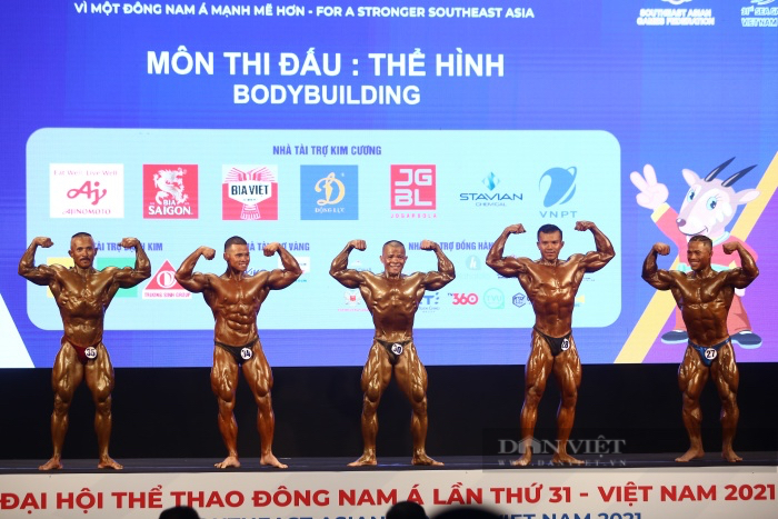 Mãn nhãn cơ bắp cuồn cuộn của VĐV Trần Hoàng Duy Thuận đoạt huy chương vàng thể hình SEA Games 31 - Ảnh 1.