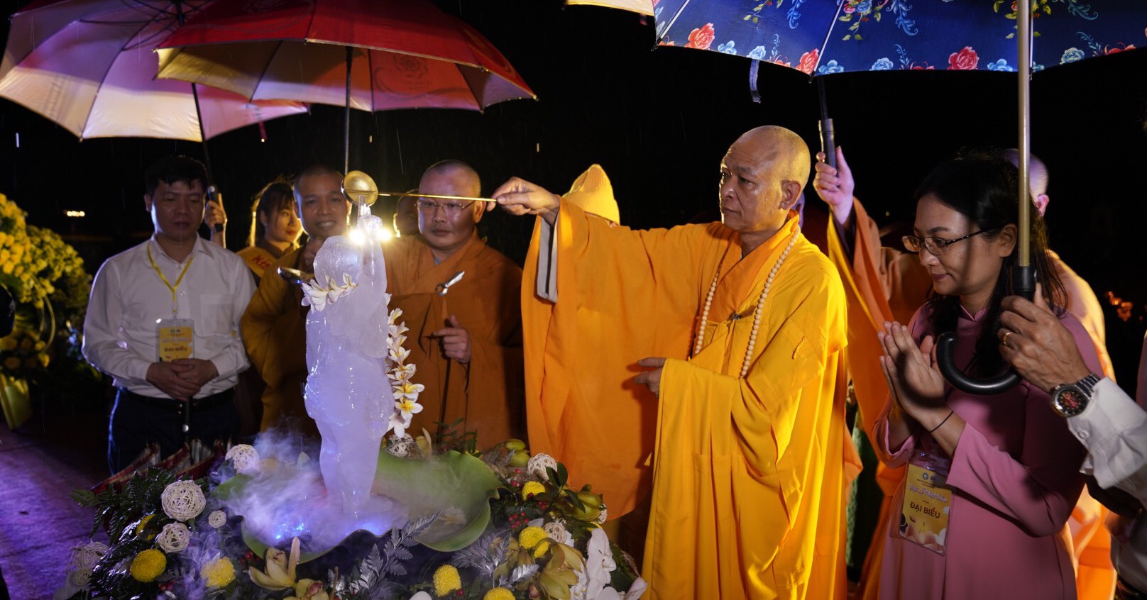 Thousands of Buddhists wear rain gear to celebrate Buddha’s birthday at Tam Chuc Pagoda