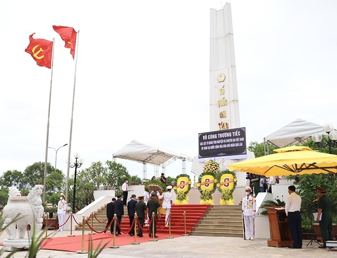 Quảng Bình: Truy điệu, an táng 17 hài cốt liệt sĩ hy sinh tại Lào - Ảnh 2.