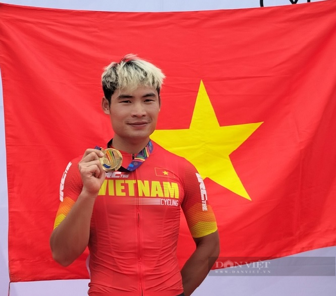 SEA Games 31: Chàng trai dân tộc Thái quê Sơn La “giật” huy chương vàng trong đua xe đạp - Ảnh 1.