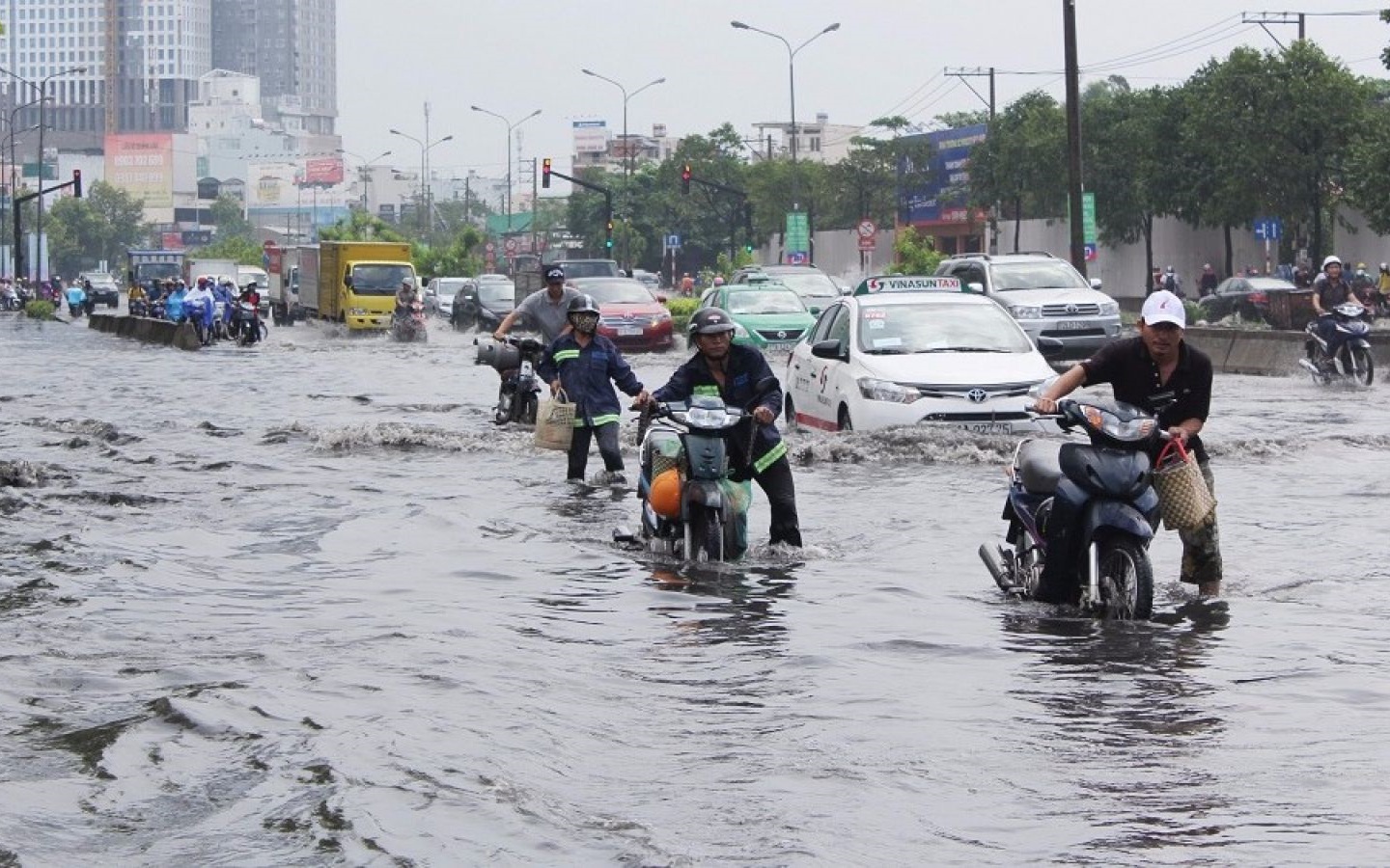 Experience riding a motorbike through a flooded area to avoid stalling