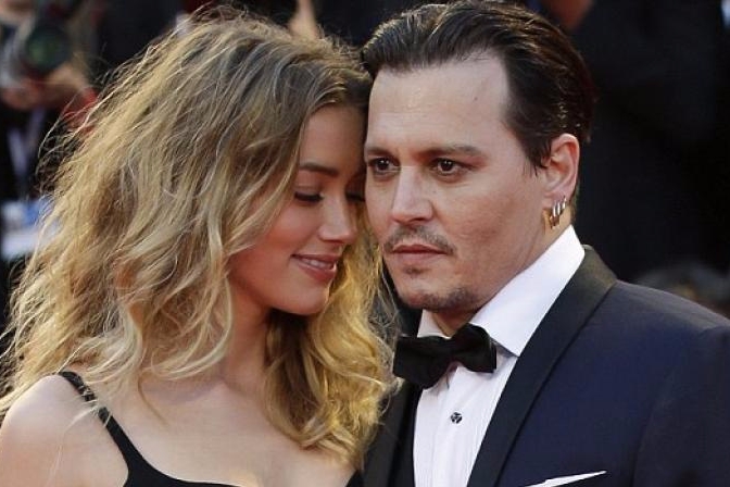 Canh bạc đáng giá 50 triệu USD của Johnny Depp và Amber Heard - Ảnh 1.