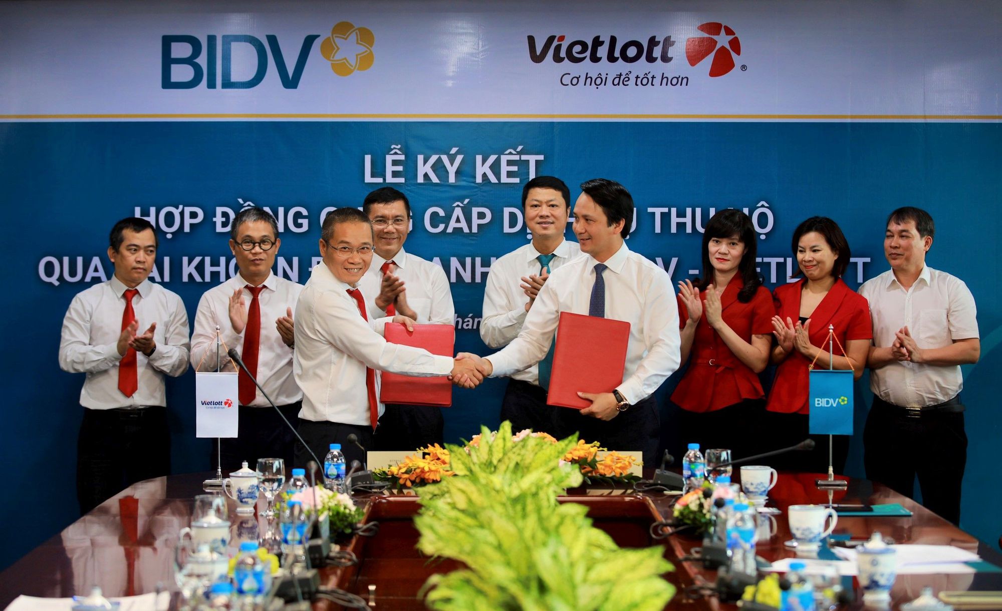 BIDV và Vietlott ký kết hợp đồng dịch vụ thu hộ qua tài khoản định danh - Ảnh 1.