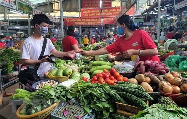 Chợ truyền thống Việt trong bài toán giá &quot;tăng nhanh giảm chậm&quot; - Ảnh 1.