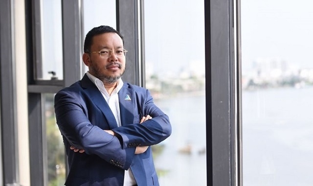 Chủ tịch Đất Xanh Lương Trí Thìn gom thêm 5 triệu cổ phiếu DXG - Ảnh 1.
