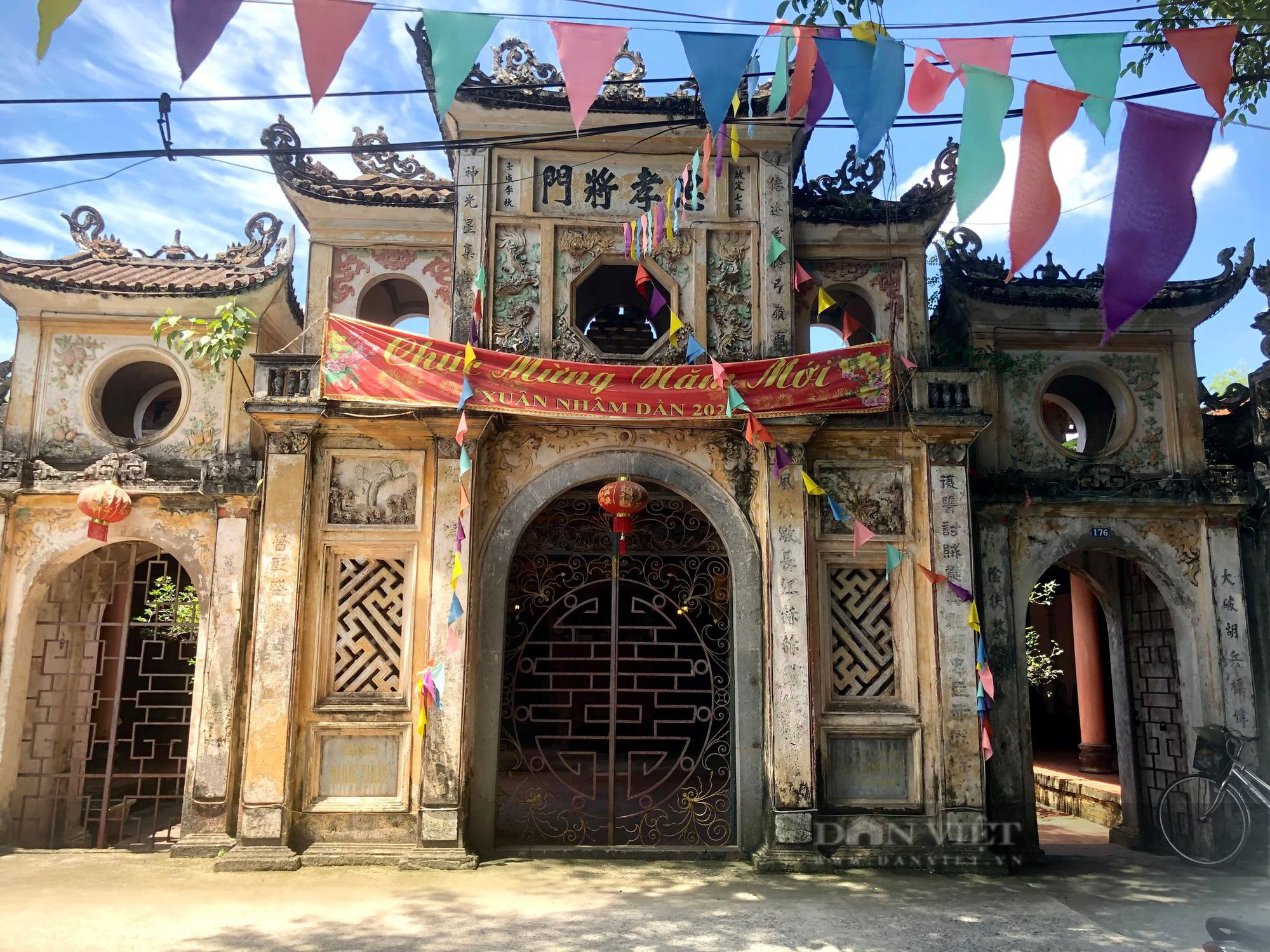 Độc đáo ngôi làng lưu giữ nhiều cổng cổ hàng trăm năm tuổi ở ngoại thành Hà Nội - Ảnh 6.