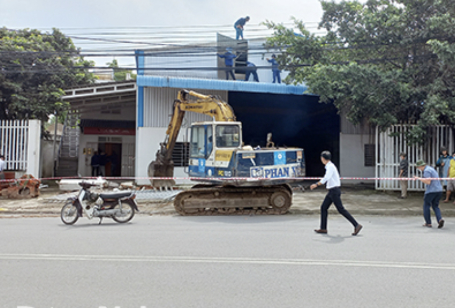 Cưỡng chế thu hồi đất ven sân bay Biên Hoà để xử lý dioxin - Ảnh 1.