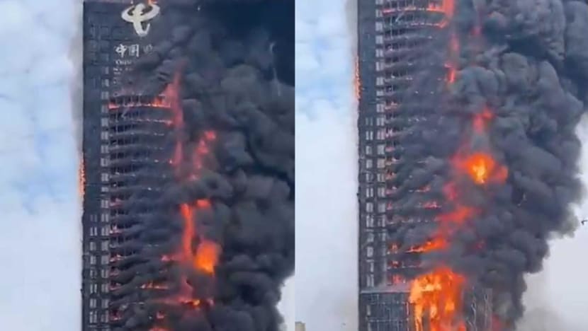 Trung Quốc: Cháy lớn nhấn chìm tòa nhà chọc trời trong biển lửa - Ảnh 1.