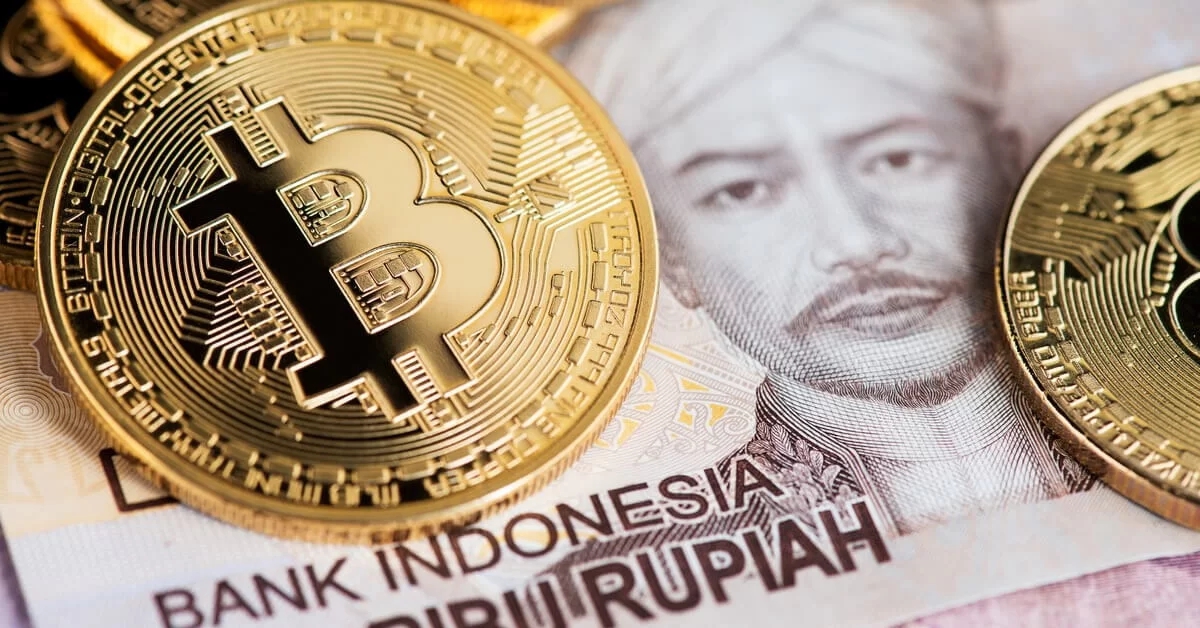 Indonesia đang cân nhắc các quy định mới trên các sàn giao dịch tiền điện tử để loại bỏ quyền sở hữu nước ngoài và yêu cầu ngừng tái đầu tư tiền của người dùng. Ảnh: @AFP.