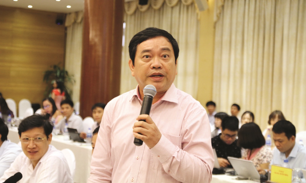 GS Trần Thọ Đạt: Doanh nghiệp phải trả giá đắt khi Việt Nam giữ ổn định tỷ giá, lạm phát - Ảnh 1.