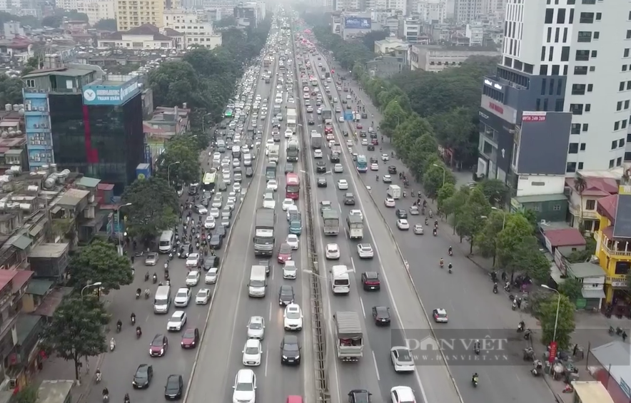 Người dân Hà Nội đổ dồn tới bến xe để về quê nghỉ Tết Quỹ Mão 2023 - Ảnh 9.
