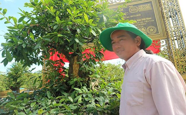 Tết Quý Mão 2023, điểm lại loạt siêu cây cảnh xác lập kỷ lục Việt Nam khiến dư luận xôn xao - Ảnh 8.