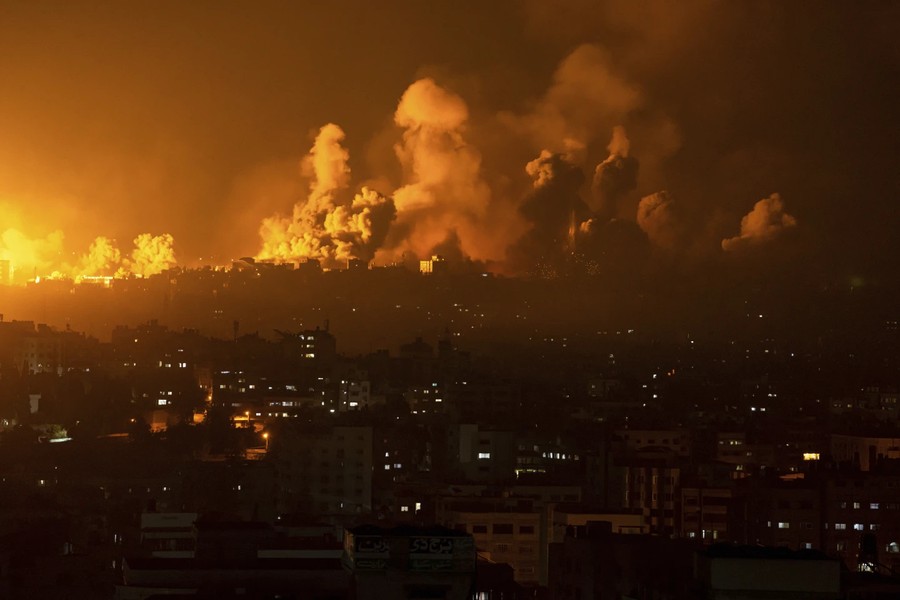 Cảnh tàn phá và đau thương khi hơn 1.100 người thiệt mạng trong xung đột Israel-Hamas - Ảnh 1.