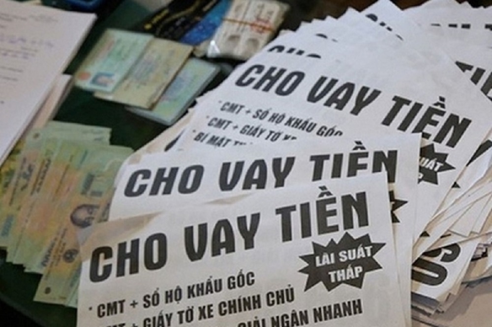 Hai cán bộ công an phường ở Hà Nội bị cáo buộc cho vay nặng lãi, tổ chức ghi lô đề - Ảnh 1.