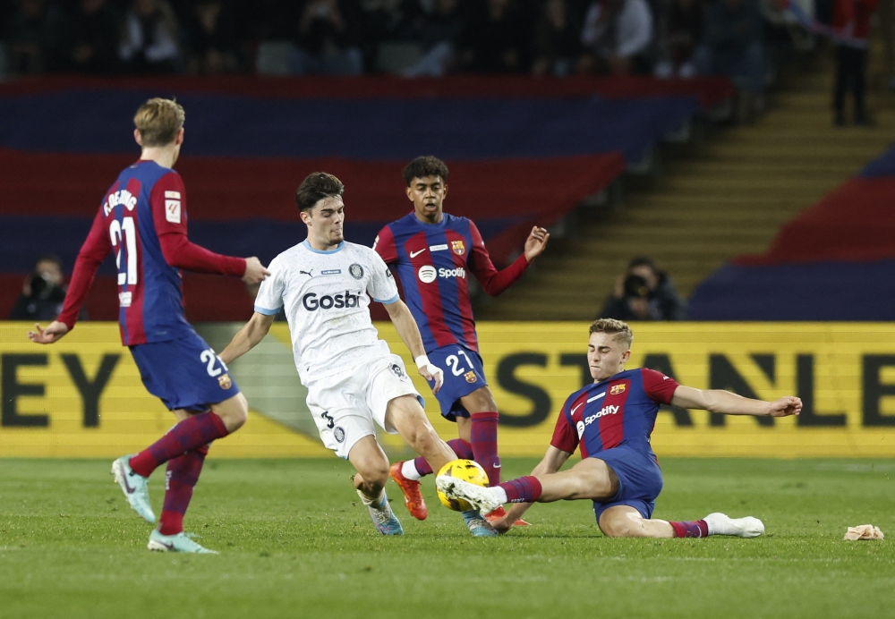 Không thể ngăn cản “hiện tượng” Girona, Barca thất thế tại La Liga - Ảnh 1.