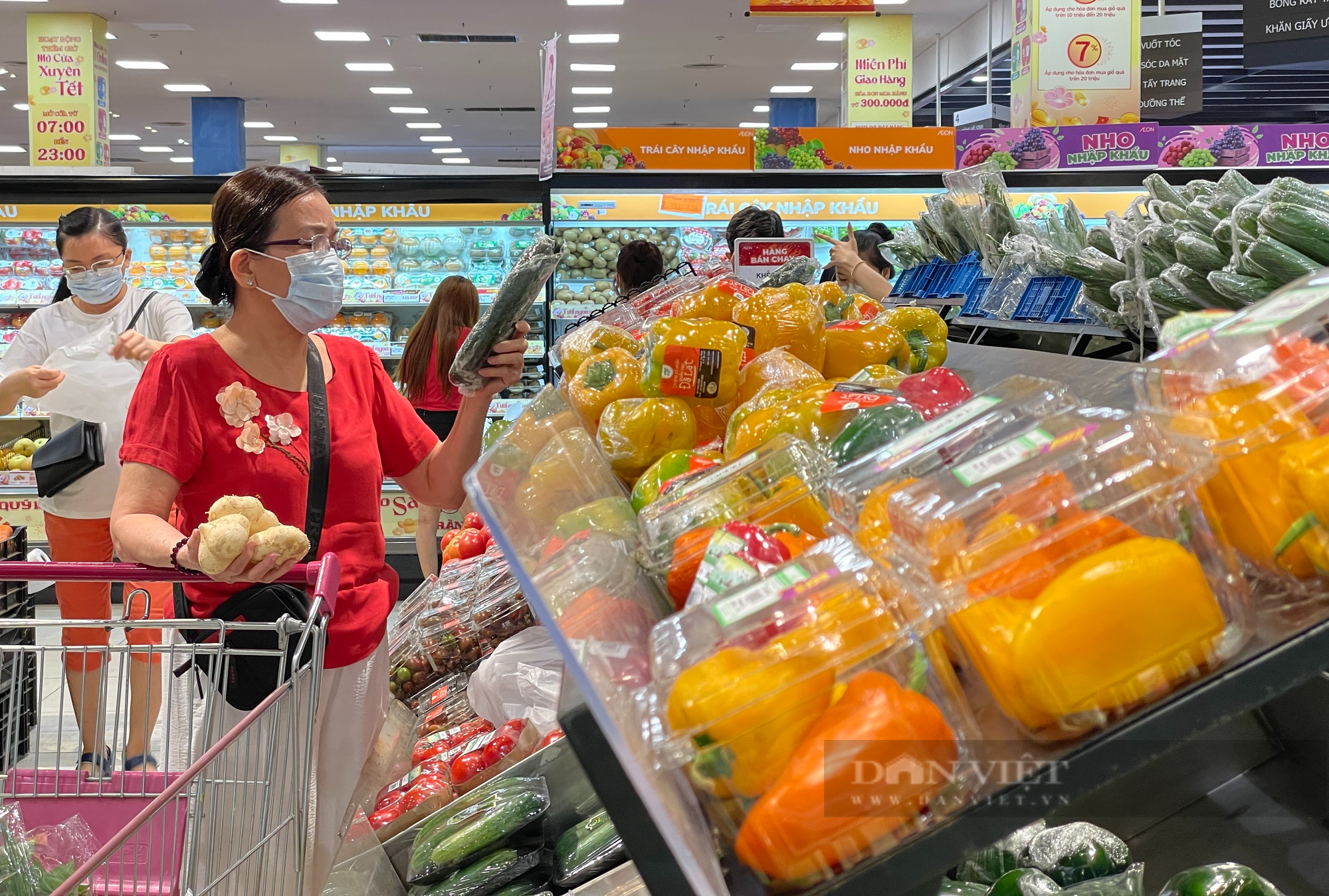 Giá thực phẩm ổn định sau Tết, hàng khuyến mãi đầy kệ siêu thị - Ảnh 2.