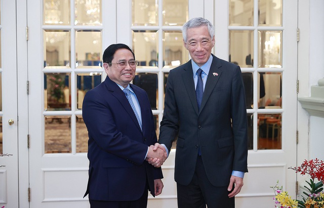 Ảnh: Lễ đón Thủ tướng Phạm Minh Chính thăm chính thức Singapore - Ảnh 3.