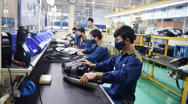 Quốc tế đánh giá Việt Nam là điểm sáng về phục hồi sản xuất - Ảnh 1.