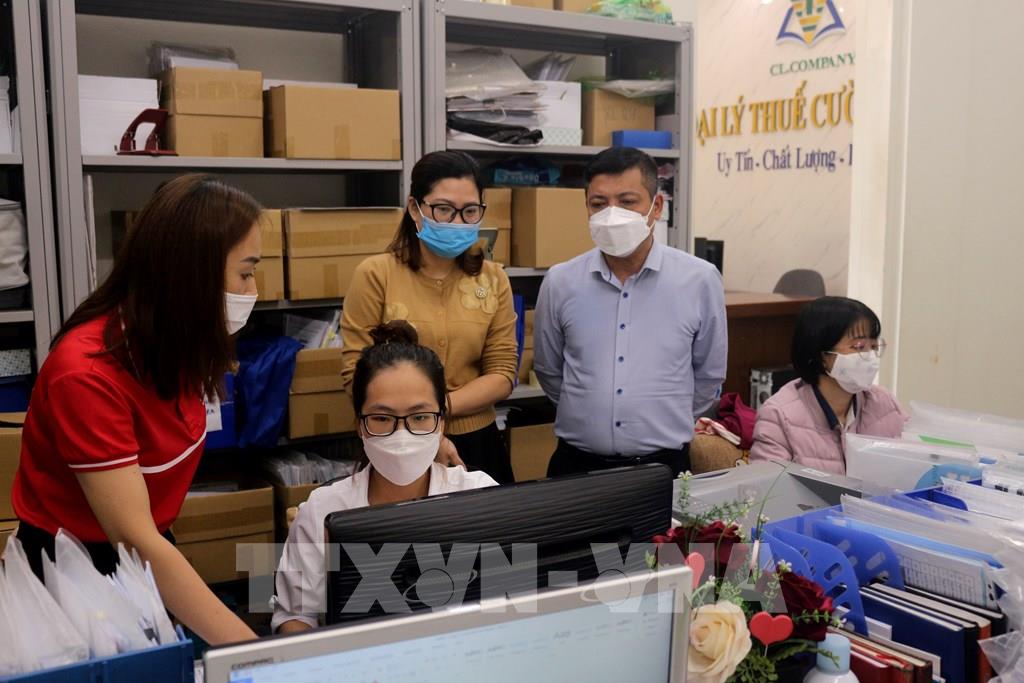 TP. Hồ Chí Minh thúc đẩy triển khai hóa đơn điện tử khởi tạo từ máy tính tiền - Ảnh 1.