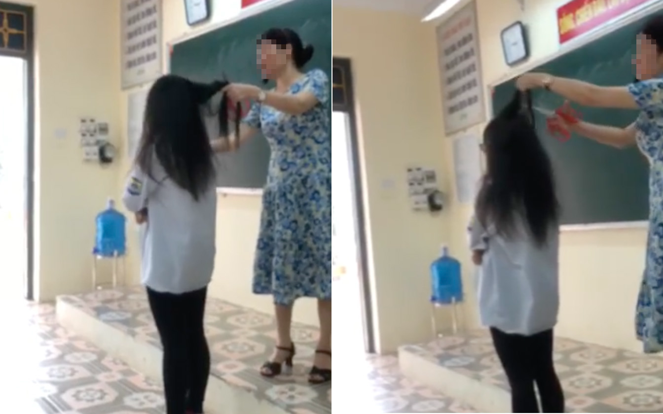 Xôn xao clip nữ sinh bị cô giáo cầm kéo cắt tóc ngay trước lớp vì... nhuộm light - Ảnh 1.