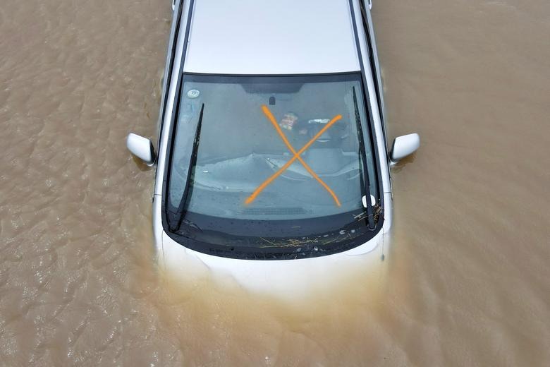 Lũ lụt tàn phá California, ôtô nổi lềnh phềnh - Ảnh 7.