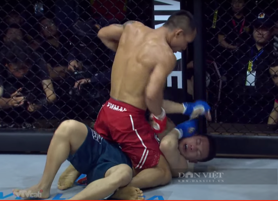 Trần Quang Lộc hạ knock out Lý Tiểu Long ngay hiệp 1 - Ảnh 1.