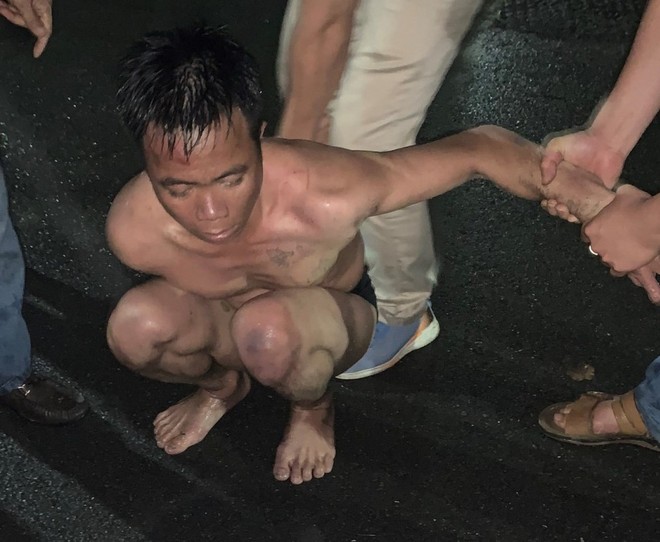 Kẻ bị truy nã đặc biệt nguy hiểm lẩn trốn dưới nước hàng tiếng đồng hồ ở Quảng Ninh - Ảnh 1.