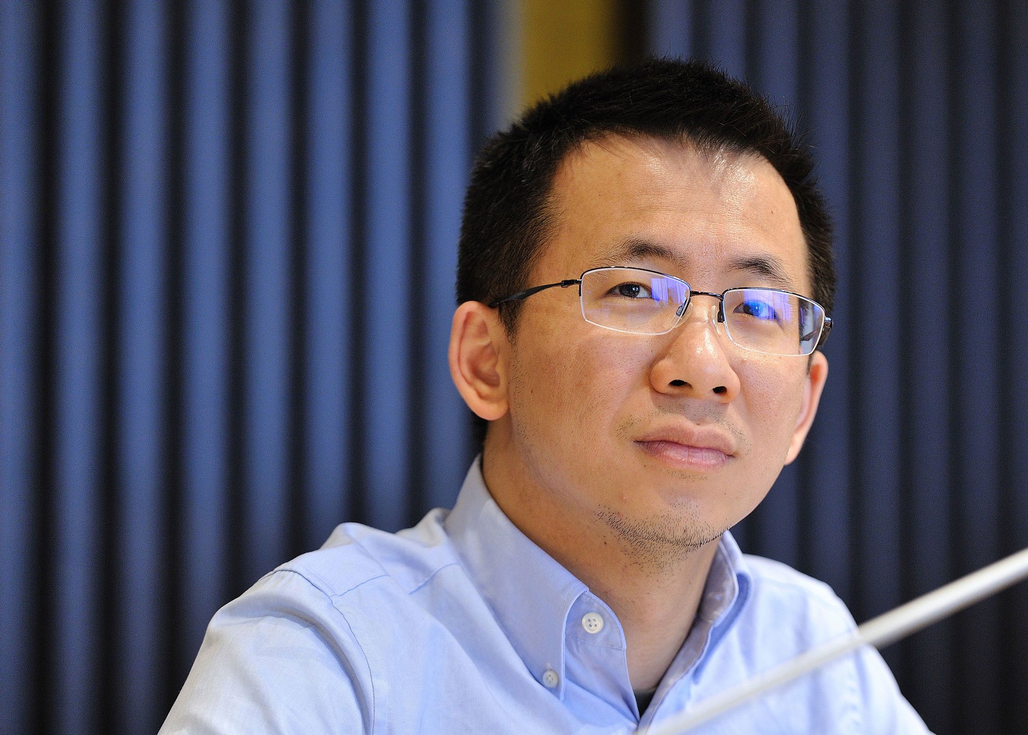 Sản phẩm đầu tiên của Zhang và ByteDance là một ứng dụng tổng hợp tin tức có tên là Toutiao. Ảnh: @AFP.