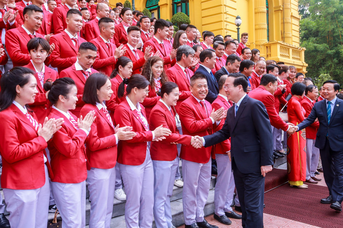 Chủ tịch nước trao Huân chương cho các VĐV, HLV xuất sắc tại SEA Game 32 - Ảnh 3.