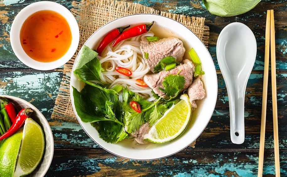 8 món ăn đường phố Việt Nam nổi tiếng nhất - Ảnh 8.