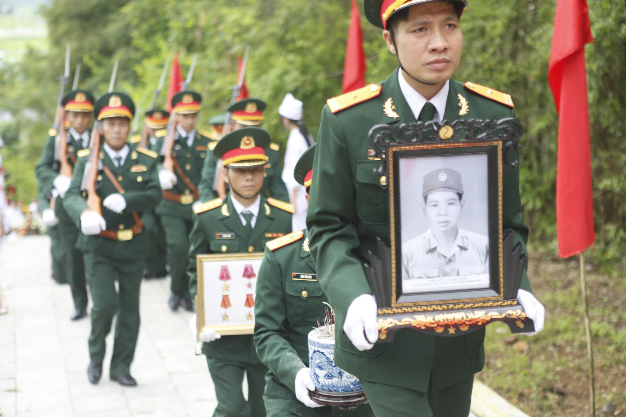 Yên Bái: Tổ chức truy điệu, án táng hài cốt liệt sĩ Lò Văn Nối hy sinh tại Lào - Ảnh 1.