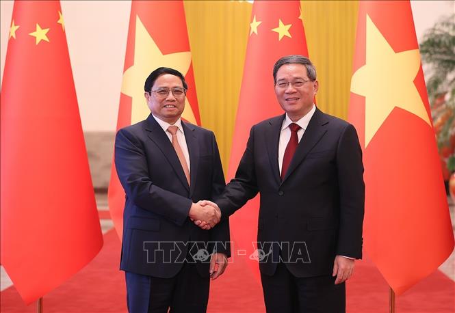 Lễ đón chính thức Thủ tướng Phạm Minh Chính thăm Trung Quốc - Ảnh 3.