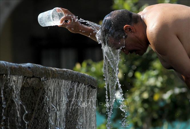 Hình ảnh nắng nóng hoành hành ở Mexico, ít nhất 100 người thiệt mạng - Ảnh 4.