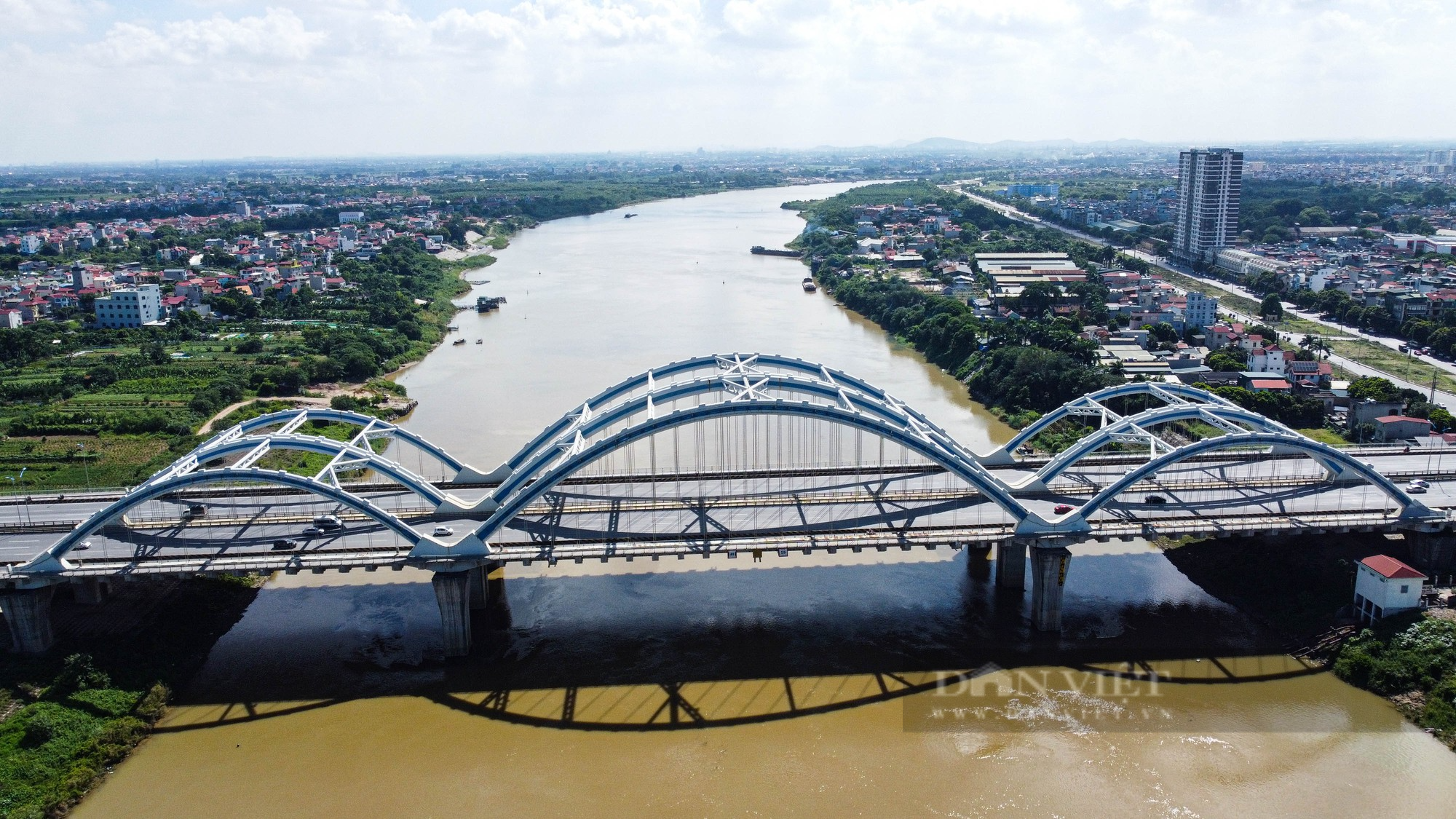 Chiêm ngưỡng cây cầu vòm thép vượt sông rộng nhất Việt Nam sau gần 10 năm đưa vào sử dụng - Ảnh 6.