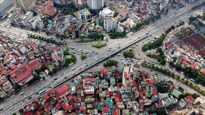 Sau 15 năm mở rộng địa giới hành chính, hạ tầng giao thông Hà Nội phát triển ra sao? - Ảnh 2.