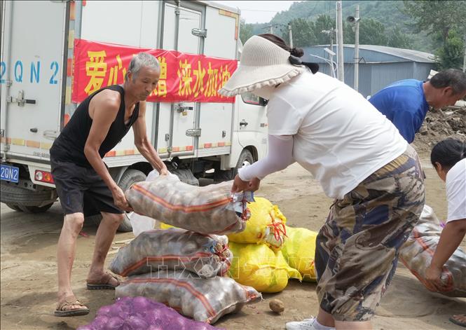 Lũ lụt ở Trung Quốc có thể gây tăng giá lương thực toàn cầu - Ảnh 2.