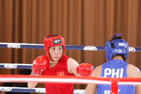 Thẳm sâu trong nhà vô địch boxing SEA Games 32 vẫn là một người mẹ mềm yếu - Ảnh 2.