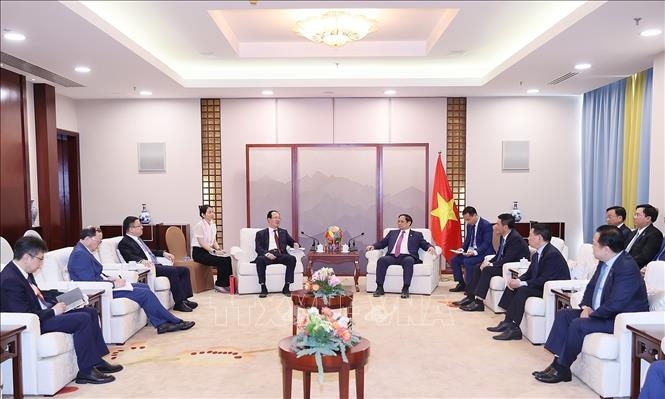 Thủ tướng Phạm Minh Chính tiếp lãnh đạo một số tập đoàn kinh tế hàng đầu Trung Quốc - Ảnh 2.